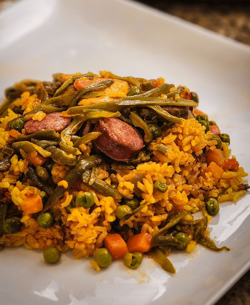 Paella with Colombian chorizo and vegetables.